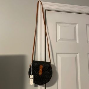 Anthropologie Bali Circle Crossbody Bag in black. NWT.